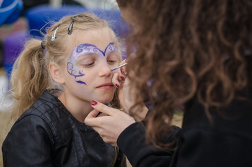 little girl with face painting © katarinagondova