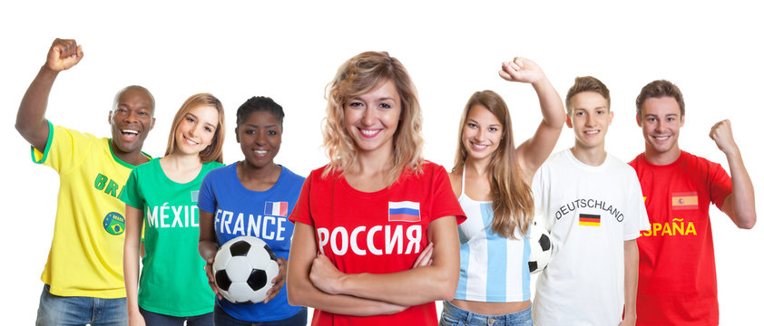 Laughing russian soccer supporter with fans from other countries