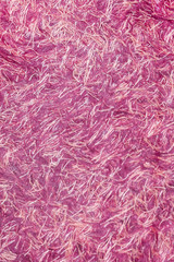 Colorful pink background of modern materials. background of threads