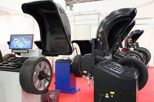 Equipment for car service and repair - tire machines for balancing car wheels (balancing stands)