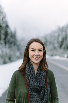 Portrait of Beautiful Photographer in Winter Landscape