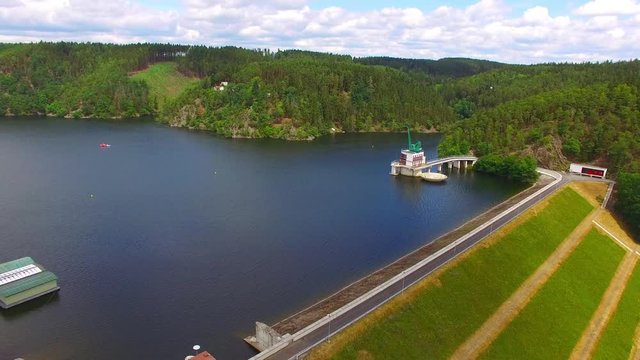 The Hracholusky dam with water power plant. The water reservoir on the river Mze. Source of renewable energy and popular recreational area in Western Bohemia. Czech Republic, Europe.