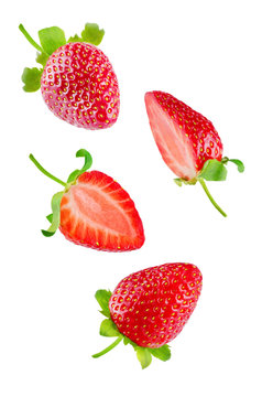 Fresh flying strawberries isolated