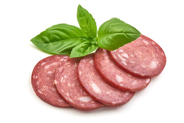 Smoked salami with green basil isolated on the white background.