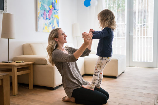 Daughter And Mom Having A Good Time Together At Home