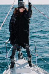 Obraz premium Young girl on a boat