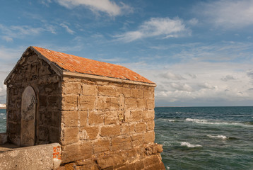 Fototapeta na wymiar Mareógrafo of the Castle of San Sebastián in the city of Cádiz. Spain