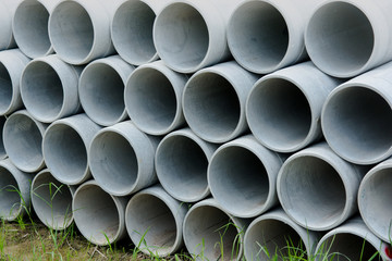 Close up concrete, cement pipes stacking,  pattern background. concrete pipes for irrigation