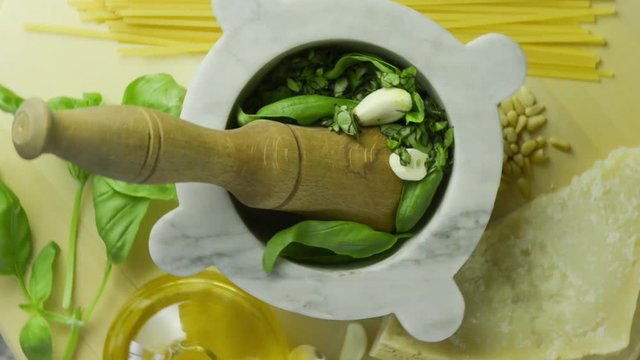Ingredients for Genoise pesto sauce on the kitchen table