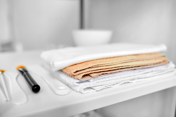 Cosmetic brushes, spatulas and towels