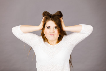 Fototapeta premium Attractive woman having angry frustrated face expression