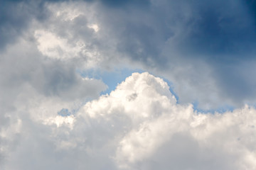 Naklejka na ściany i meble Cumulus Clouds in the blue sky before the storm