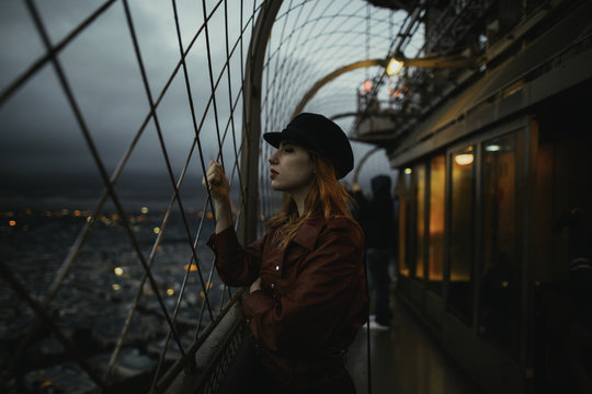 stylish woman enjoying the view from the eiffel tower