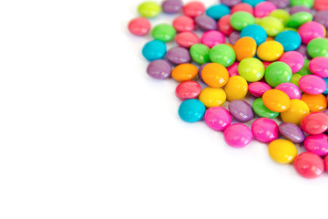 colorful chocolate coated candy isolated on white background. with copy space