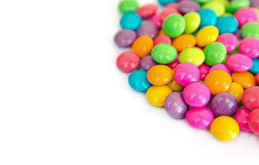 colorful chocolate coated candy isolated on white background. with copy space