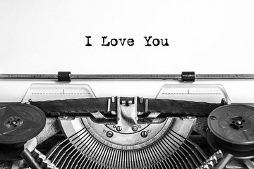 I love you! text typed on an old typewriter, vintage paper, close-up recognition