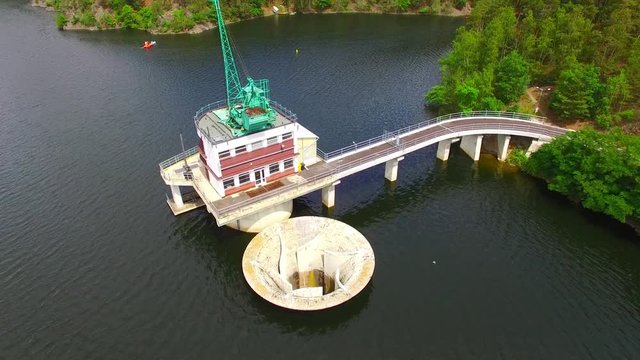 The Hracholusky dam with water power plant. The water reservoir on the river Mze. Source of renewable energy and popular recreational area in Western Bohemia. Czech Republic, Europe.