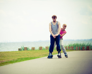 roller skater couple skating outdoor