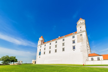 Naklejka premium Bratislava, Slovakia May 24, 2018: Bratislava castle. Bratislavsky Hrad close-up panorama with no people in sunny day. Exterior view of the castle in Bratislava.
