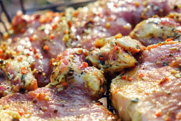 Beef meat steaks. Fresh raw pork neck for steak with herb spices on a barbecue grill
