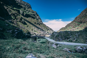 Wishing Bridge of Gap of Dunloe, a narrow mountain pass forged between the MacGillycuddy Reeks and Purple Mountain by glacial flows