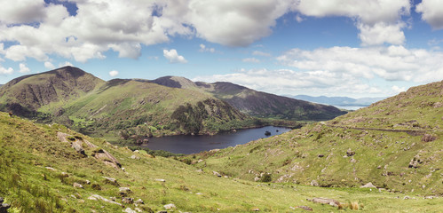 Fototapeta na wymiar Glanmore lake at Healy Pass, a 12 km route worth of hairpin turns winding through the borderlands of County Cork and County Kerry in Ireland