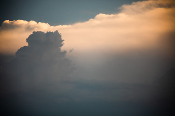 Close-up of cumulus clouds forming with silver lining