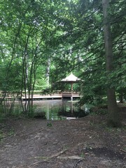 gazebo in park next to pond