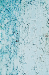 texture and paint background. white blue color. cracks on the texture. vertical