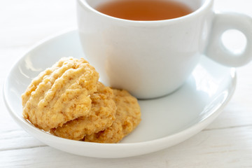 Cereal cookies and tea, selective focus.