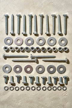 Geometric pattern of nuts, bolts, washers, screws