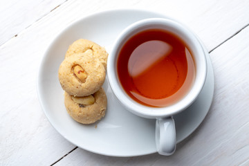 Top view tea and homemade peanut butter cookies