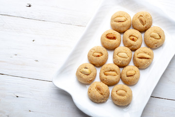 Homemade penut butter cookies on white plate, copy space