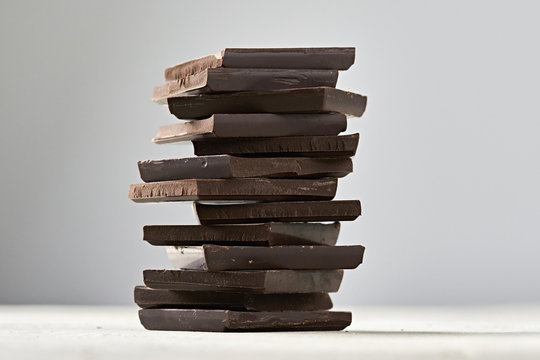 Organic Dark Chocolate Squares Stacked so tall you know you're going to have a great evening at the bonfire