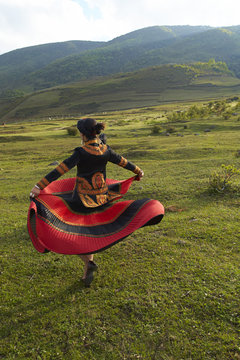 Beautiful Chinese Yi people in traditional costumes  outdoor