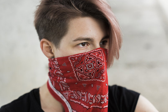 tomboy covered face with red headscarf
