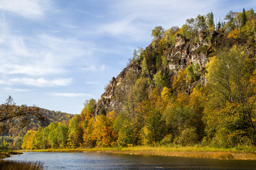 Fototapeta premium the river running along the rocky mountains