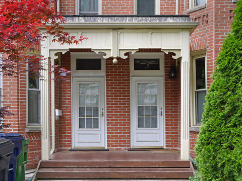 front porch with twin doors