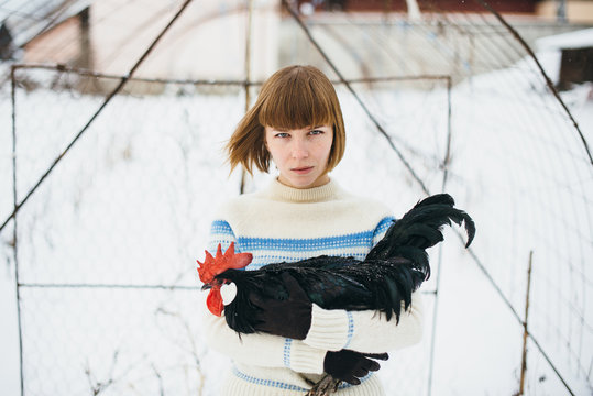 Daria posing with rooster