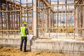 Asian business man construction engineer worker at house building site