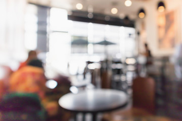 Restaurant cafe or coffee shop interior with people abstract defocused blur background