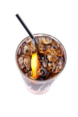 Top view glass of cold cola with lemon