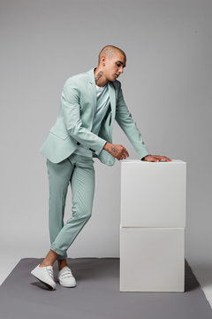 Man in green suit - minimal fashion