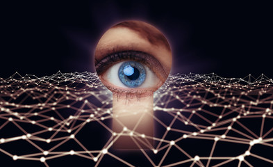 Eye looking thorough a keyhole. Network security concept.