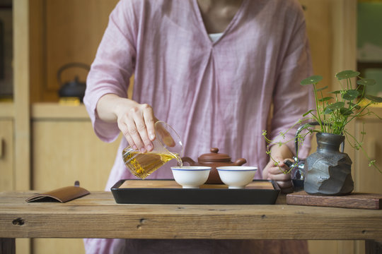 Oriental female Chinese Tea making Tea Ceremony