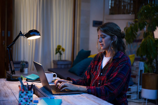 Young woman studying at home