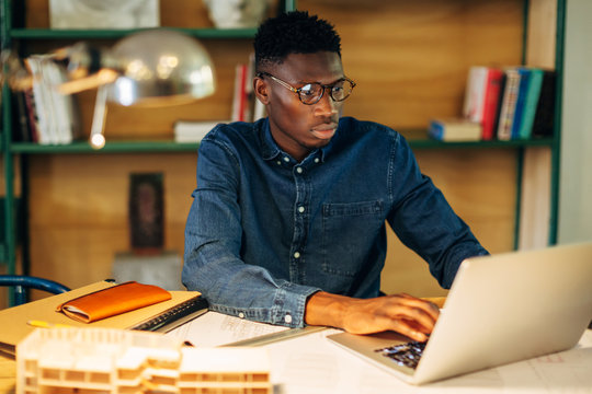 Architect young man working in your project.