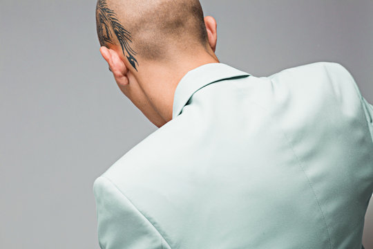 Man in green suit - minimal fashion