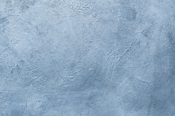 abstract distressed decor background. textured blue scratched plaster design. free space concept