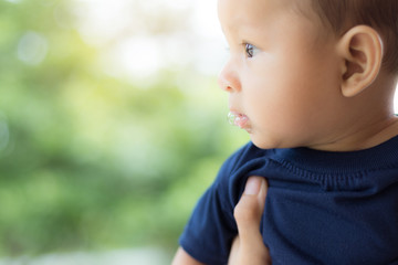 baby with saliva, asian newborn.